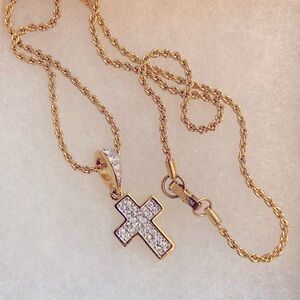 Swarovski signed gold tone cross